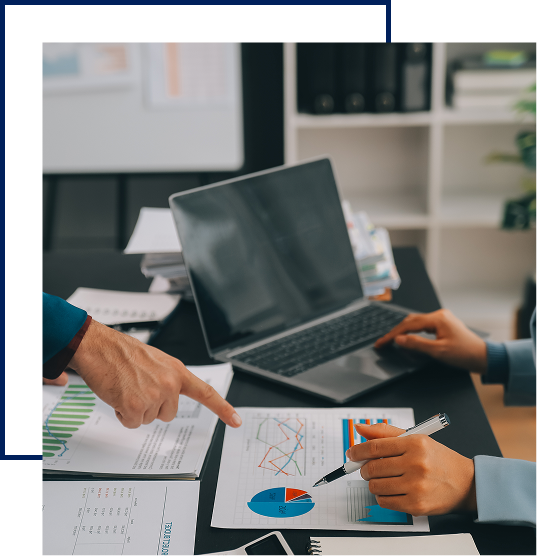 Professionals reviewing financial reports together